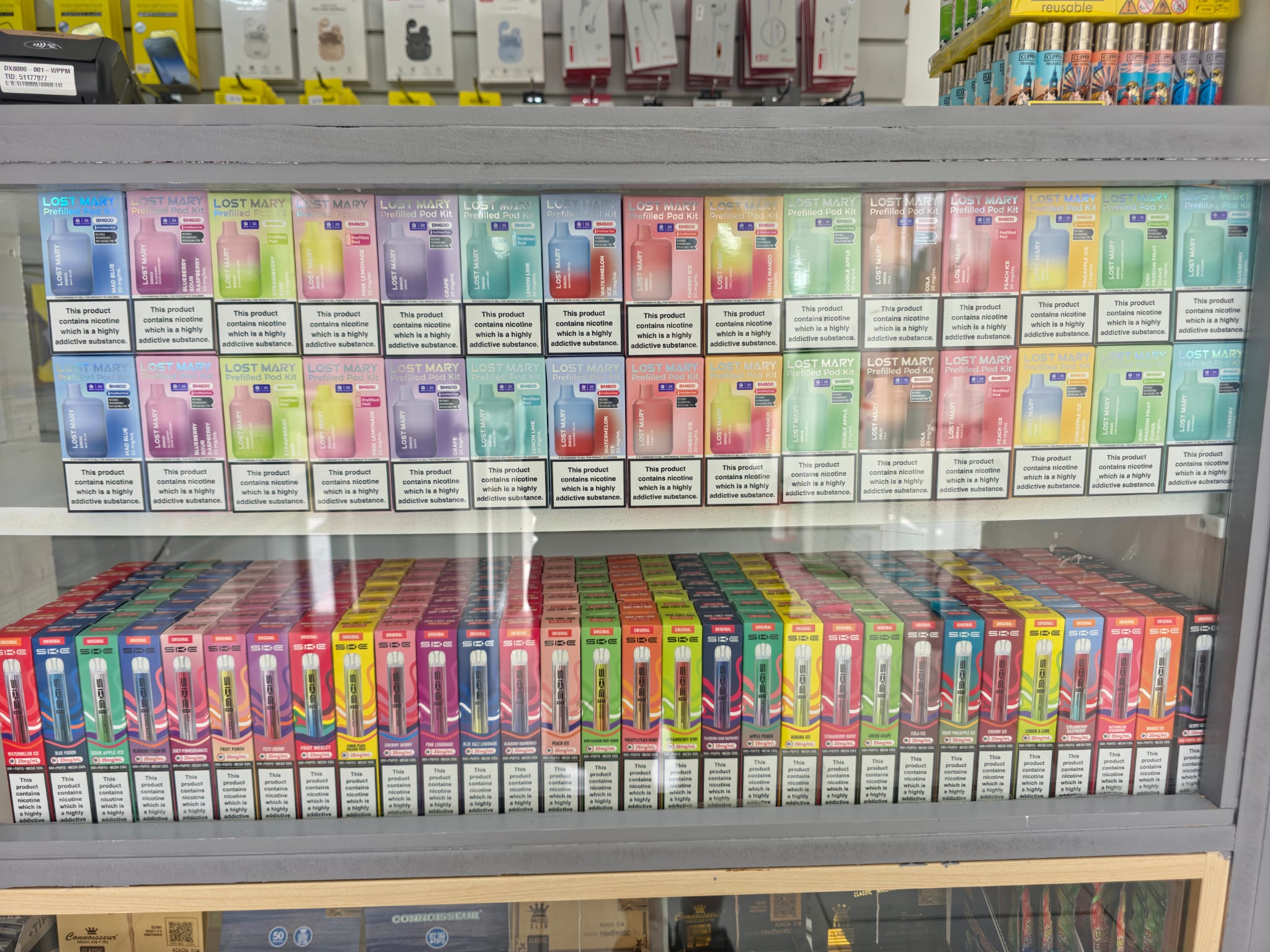 Phone accessories and vape wall inside JC Tech Cowley